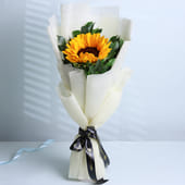 Radiant Sunflower Wrapped In Elegant Paper