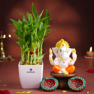 Bamboo Plant With Ganesha Idol N Diyas
