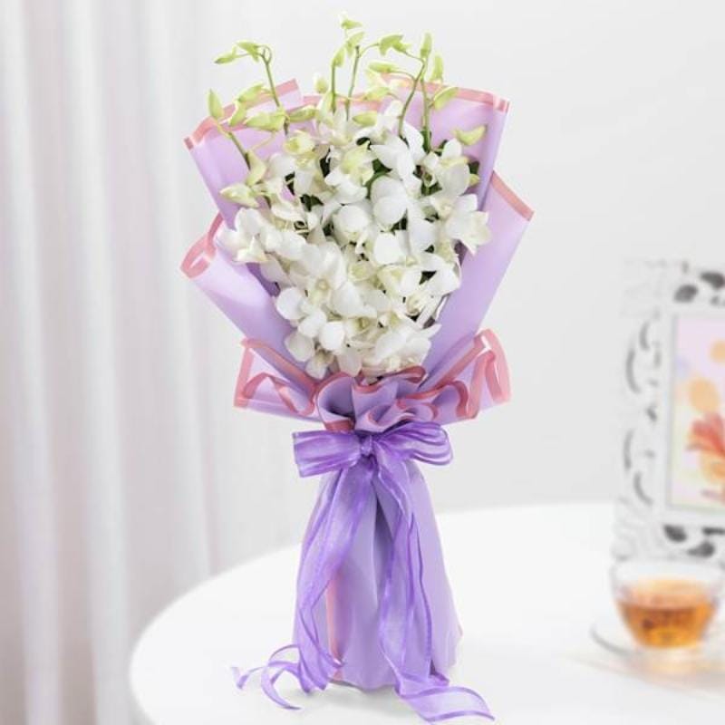 10 White Orchids in Luxe Black Wrap