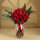 Passionate Red Roses in Dholak Vases with Greenery