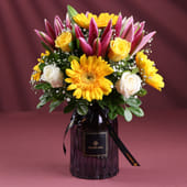 Vibrant Mix of Gerberas, Roses & Lilies in Vase