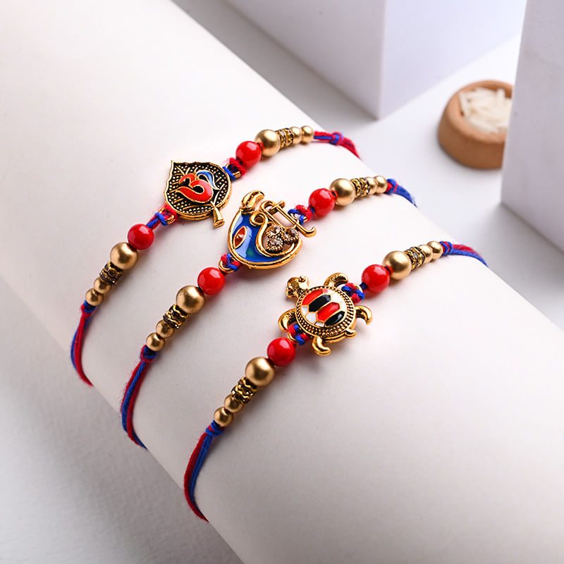 Send Set of 3 Good Omen Designer Rakhis to USA