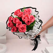 12 Pink Roses In White Paper