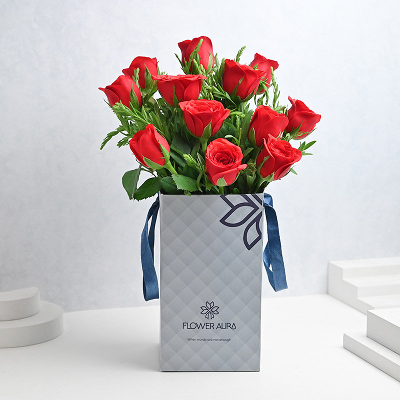 12 Red Roses in Blue Box