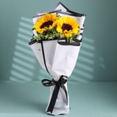 2 Sunflower Wrapped In White China Paper