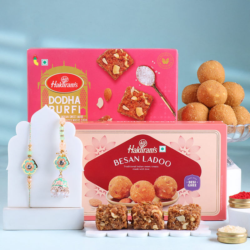 Pastel Floral Bhaiya Bhabhi Rakhis With Classic Sweets