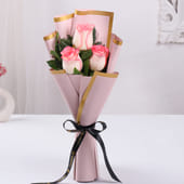 3 Pink Roses In Pink Paper