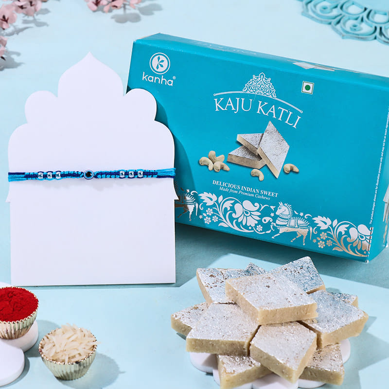 Blue Pearl Evil Eye Rakhi With Kaju Katli