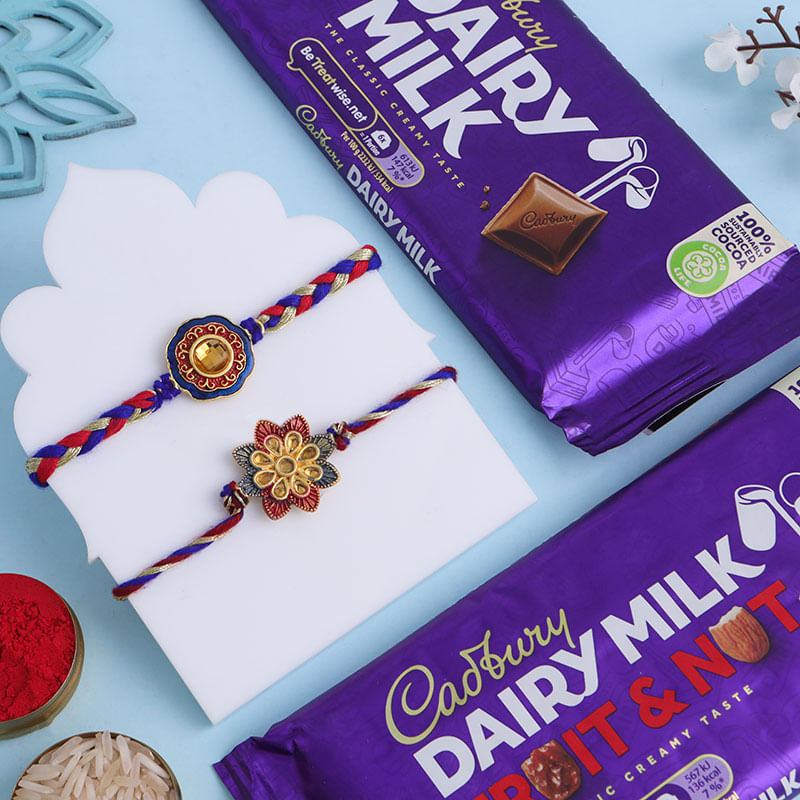 Two Regal Floral Rakhis With Nutty Chocolate Set