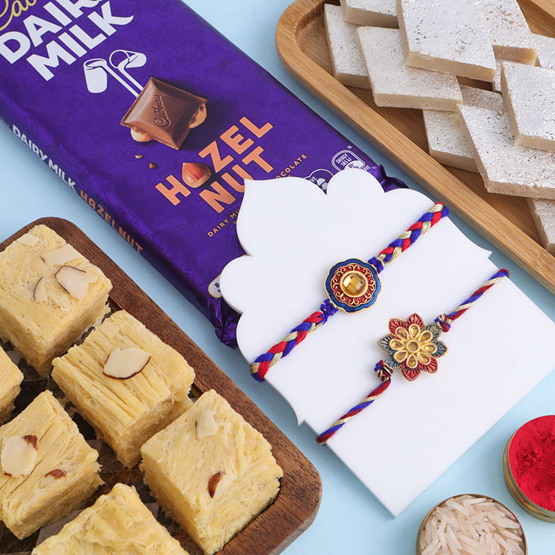 Two Traditional Rakhis With Chocolate N Sweets