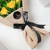 Bouquet of 10 Yellow Roses in Brown Jute Packing