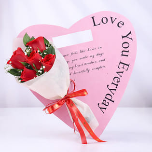 Red Roses Wrapped In Heartfelt Devotion