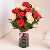 Radiant Blossoms In Glass Vase - MKTPLC