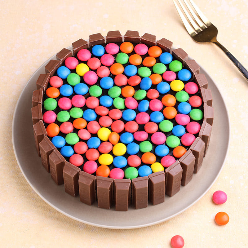 Top View Of Kitkat Gems Choco Cake Online
