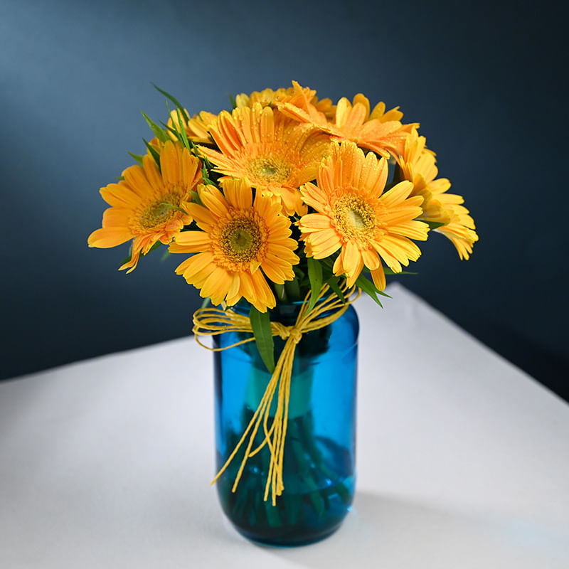 Stunning gerbera in blue Glass Vase