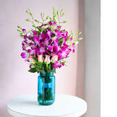 Marvelous Wonderment: 6 Purple Orchids and 4 Pink Roses in Glass Vase