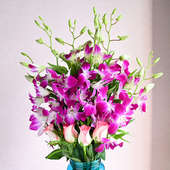 Marvelous Wonderment: 6 Purple Orchids and 4 Pink Roses