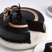 Order Tempting Truffle Cake - Sliced View of Full Cake