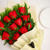 Bouquet of 12 Red Velvet Roses in White paper packing