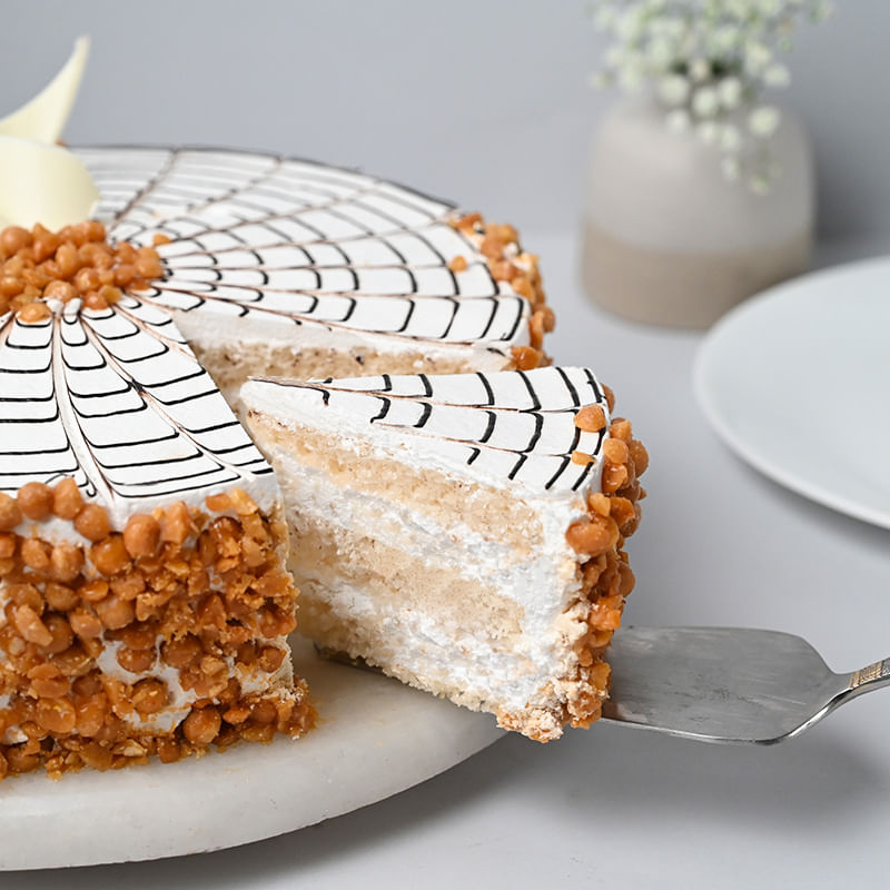 Eggless Divine Butterscotch Cake - Side Sliced View 