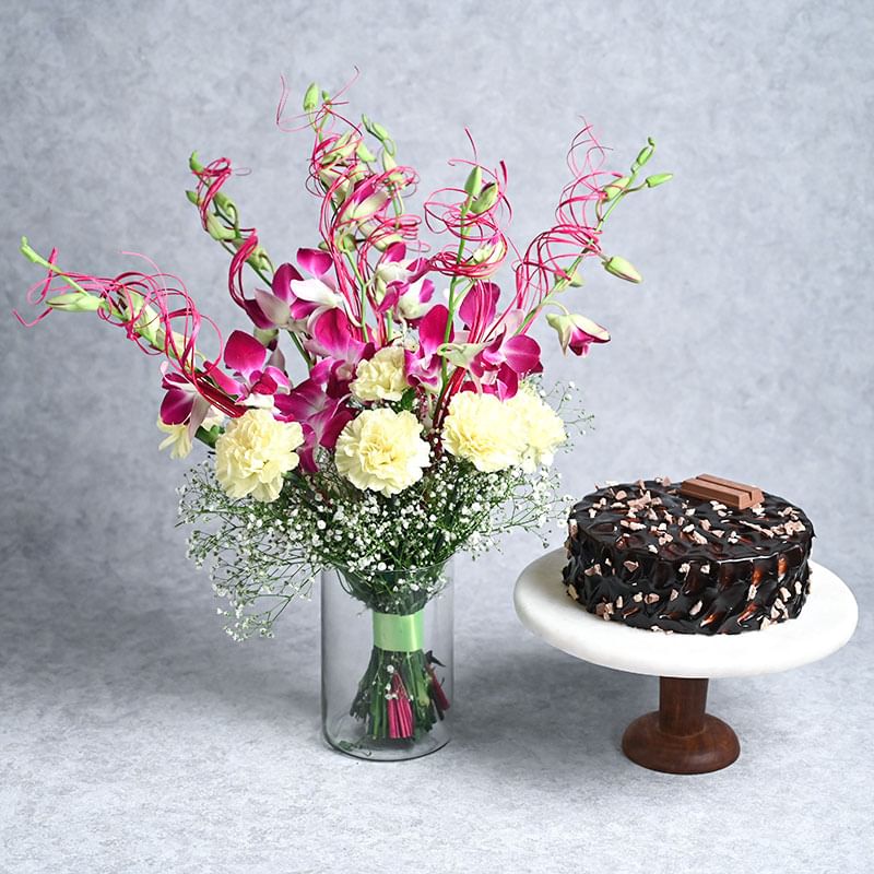 Orchids Carnations Cylindrical Glass Vase With Kitkat Cake