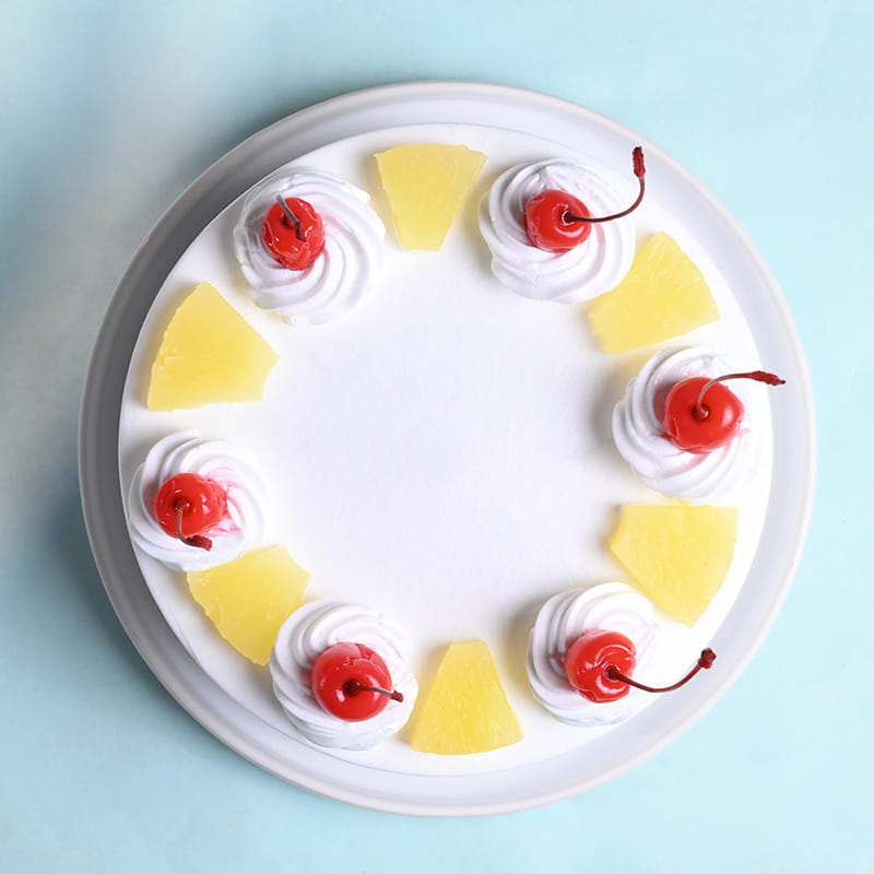 Ganesha Dial Rakhi With Pineapple Cake