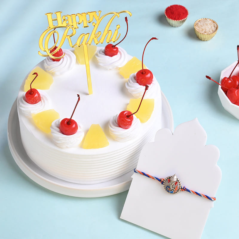 Ganesha Dial Rakhi With Pineapple Cake