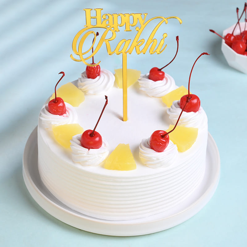 Ganesha Dial Rakhi With Pineapple Cake