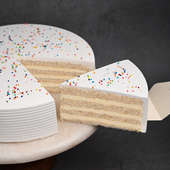 Slice View Vanilla Sprinkles Cake Delivery