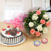 An Alluring Hamper of 10 white&#44; 10 pink roses&#44; 2 decorated diyas&#44; half kg German Blackforest cake