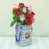 Rakhi With Twelve Red N Pink Roses N Ferrero Rocher Box
