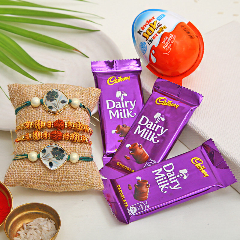 1 Kinder Joy with 3 Dairy Milk Chocolates and 4 Rakhi Combo - Order now for fast delivery