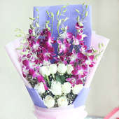 Pretty Bunch - 6 Purple Orchids and 10 White Roses