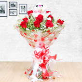 Flowery Teddy - Combo of 12 red roses with 3 white lillies and a 6 inches teddy