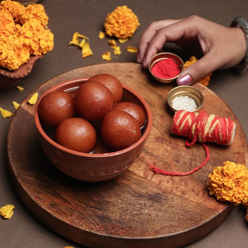 Badshahi Mithas Combo - 1 Kg Haldiram Gulab Jamun with Complementary Roli Chawal