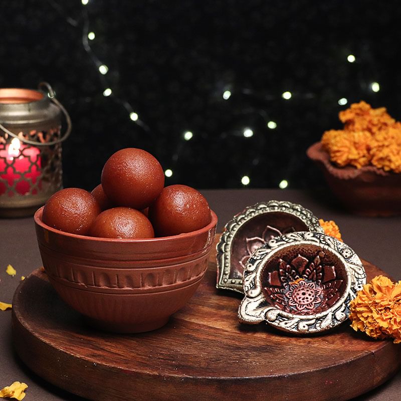 Sweetilicious Combo - 1 Kg Haldiram Gulab Jamun with 2 Designer Diyas