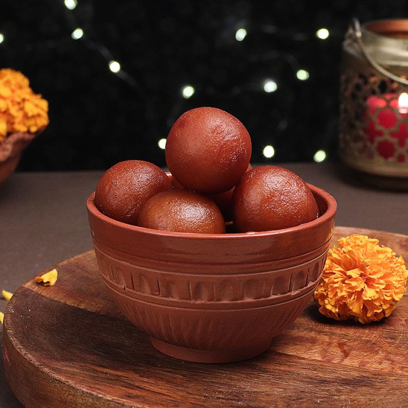 Sweetilicious Combo - 1 Kg Haldiram Gulab Jamun with 2 Designer Diyas