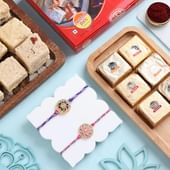 Set Of Two Floral Rakhis With Sweets