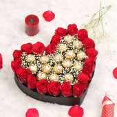 Heart shaped bouquet of 25 Red Roses with 16 Ferrero Rochers in Bouquet Centre