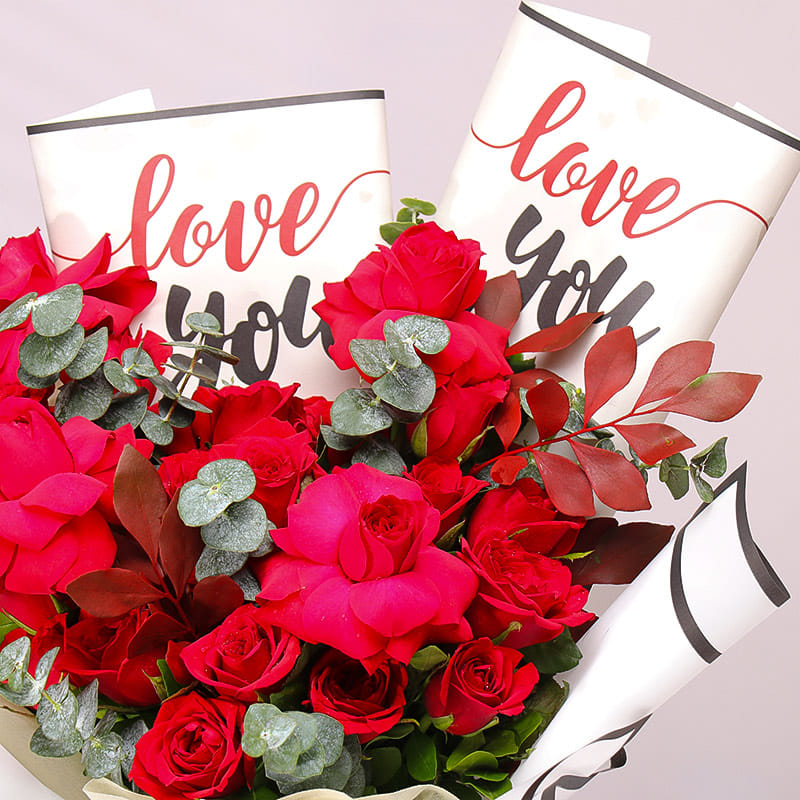 Love Wrapped In Scarlet Roses