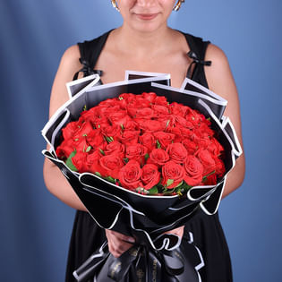 50 Red Roses and 15 White Carnations in Glass Vase