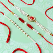 Serene Red Stone N White Pearl Designer Rakhi Trio