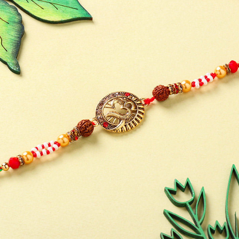 Exquisite N Antique Charm Om Rudraksha N Pearl Rakhi