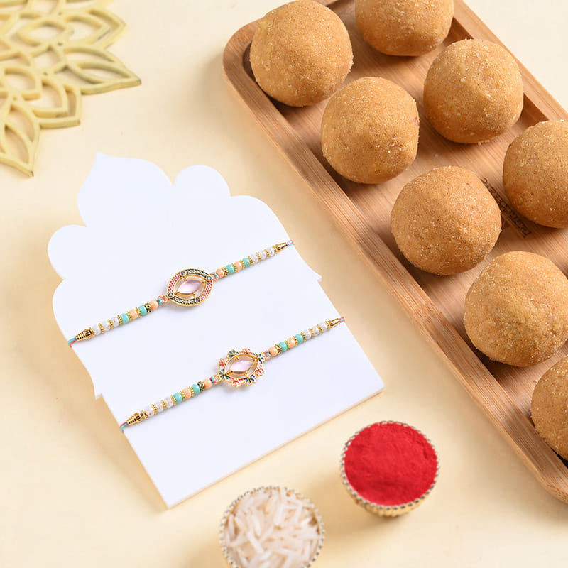 Set of 2 Designer Rakhis With Besan Ladoo