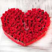 Rhythm divine - 100 red roses heart shaped bunch