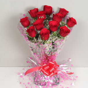 A bunch of 12 red roses packed beautifully
