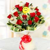 Smile All the Way - Combo of 12 red roses and 5 Ferrero Rocher chocolates with a smiley ball