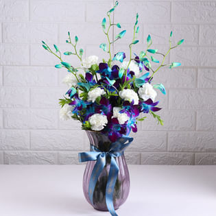 Alluring Orchids And Carnations Vase