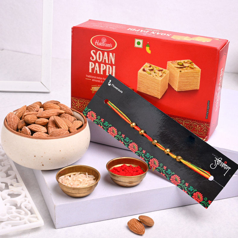 Order Almonds N Soan Papdi With Rakhi Online