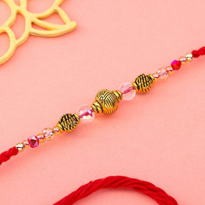 Anitique Gold N Pink Crystal Beaded Rakhi